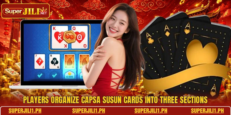 Players organize Capsa Susun cards into three sections Players organize Capsa Susun cards into three sections